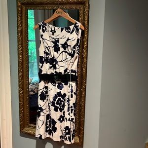 Beautiful black/blue & white dress. Never worn. Falls just below the knee.
